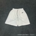 White [reflective strip shorts]