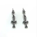 Cross Hanging by Ear