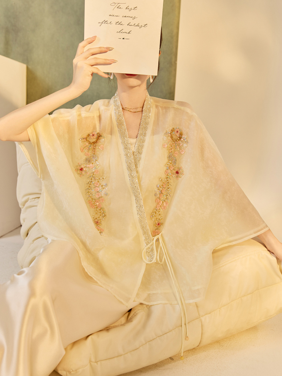 Áo khoác cardigan nữ dáng rộng thêu đính cườm chất liệu tencel phong cách nhẹ nhàng — mơ