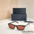 Brown frame, red lens