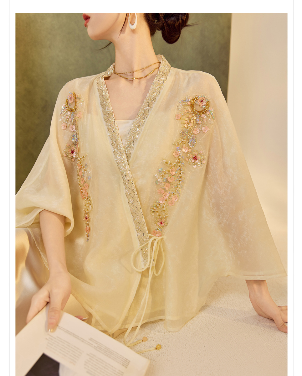 Áo khoác cardigan nữ dáng rộng thêu đính cườm chất liệu tencel phong cách nhẹ nhàng — mơ