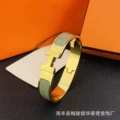 Size 17 wide version 12mm gold + dark gray bracelet with logo h
