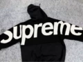 Logo embroidery on shoulders/black