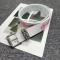 Pink cross on white background