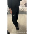 Black sweatpants [badge white label]
