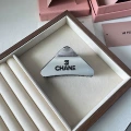 Brushed triangle silver black label