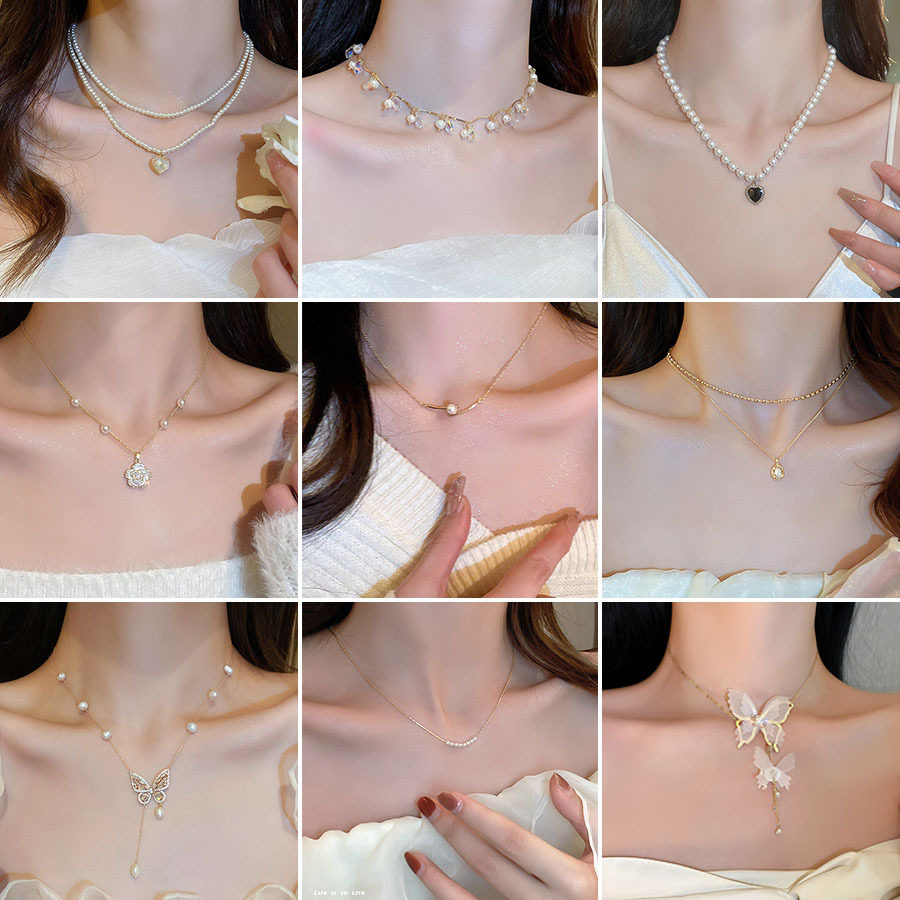Korean temperament love butterfly Pearl tassel necklace niche fashion high sense clavicle chain Joker necklace wholesale