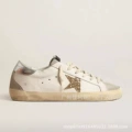 Shimmering gold star silver leather tail