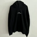 Black inverted letter embroidery