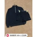 Black half-zip + short style