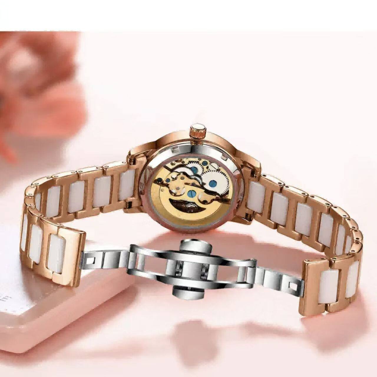 A generation of shaking audio and video number explosions sunflower hollow ladies watch ceramic white flywheel diamond watch women 4 undefined
