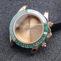Rose shell + green circle with white letters