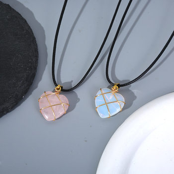 Cross-border hot selling pink crystal protein love pendant handmade copper wire winding silk peach heart necklace jewelry wholesale