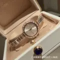 Rose gold with white dial