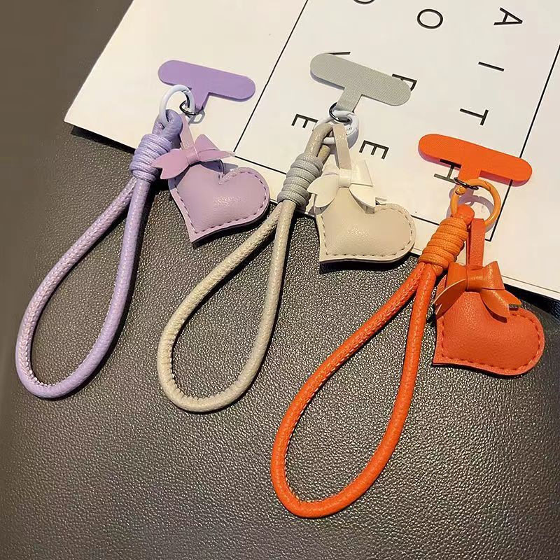 ผู้ผลิตจัดจำหน่าย จี้หัวใจหนัง สายคล้องโทรศัพท์มือถือ ทนทานแข็งแรง จี้พวงกุญแจกระเป๋า สายข้อมือ PU