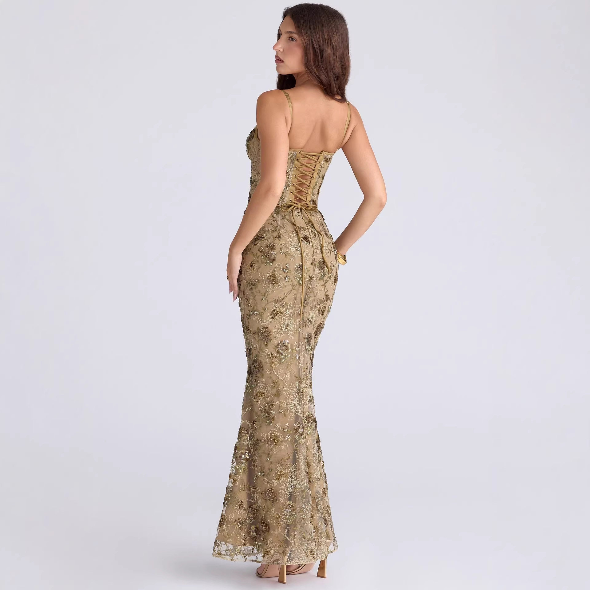 Elegant Sleeveless Backless Dress Low Neckline Tie Detail Chic Style Perfect for Parties and Special Occasions