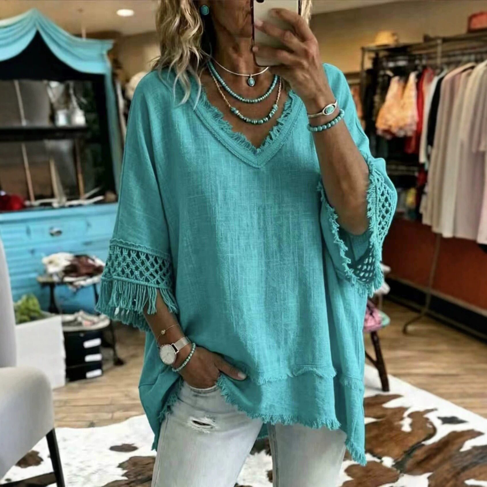 เสื้อท็อปส์เวิร์สทรงหลวม คอวี แต่งพู่ หลากสไตล์ สำหรับผู้หญิง สีพื้น รุ่นใหม่ ฤดูร้อน จำหน่ายเฉพาะทางข้ามพรมแดนยุโรป-อเมริกา บนเว็บไซต์อิสระของ Amazon