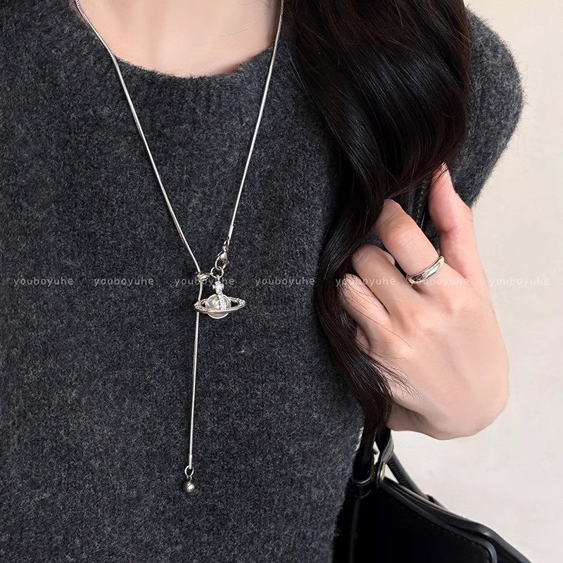 2024 New Style Pearl Saturn Pendant Necklace Advanced Sense Pull-out Adjustable Autumn and Winter Titanium Steel Woolen Chain Accessories for Women