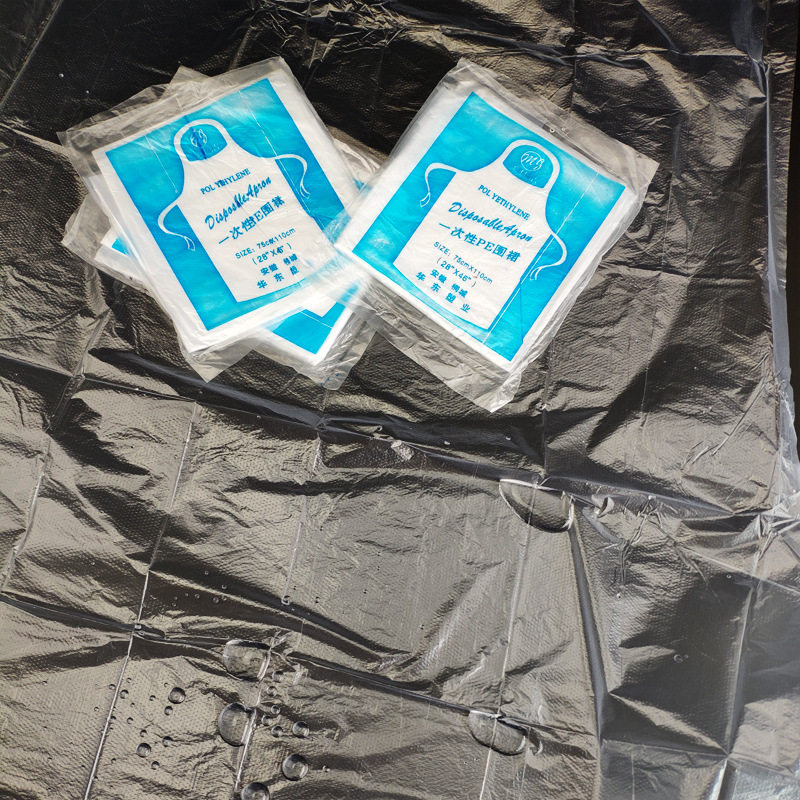 Disposable apron independent packaging thickened plastic waterproof oil-proof kitchen eating crayfish takeaway manufacturer pe bib