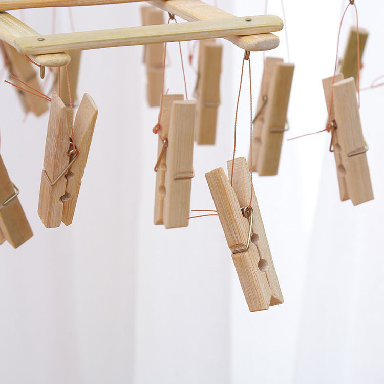 ✅Multifunctional foldable bamboo socks rack household multi-head drying clip windproof pants clip pull hanger two yuan wholesale