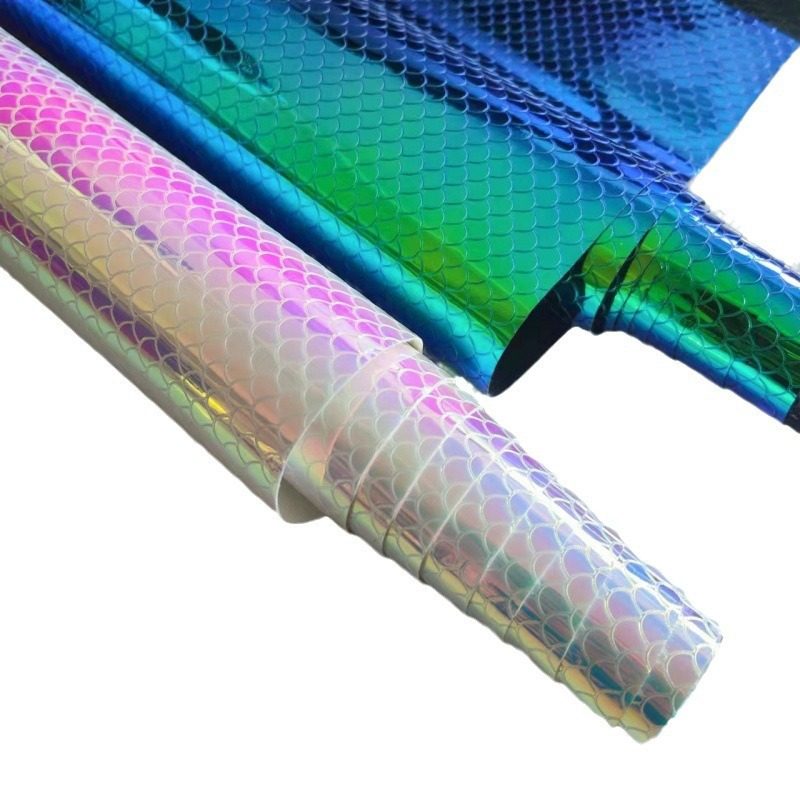 in stock manufacturers environmentally friendly fan-shaped magic color fish scale pattern embossed pu leather luggage notebook packaging hat fabric