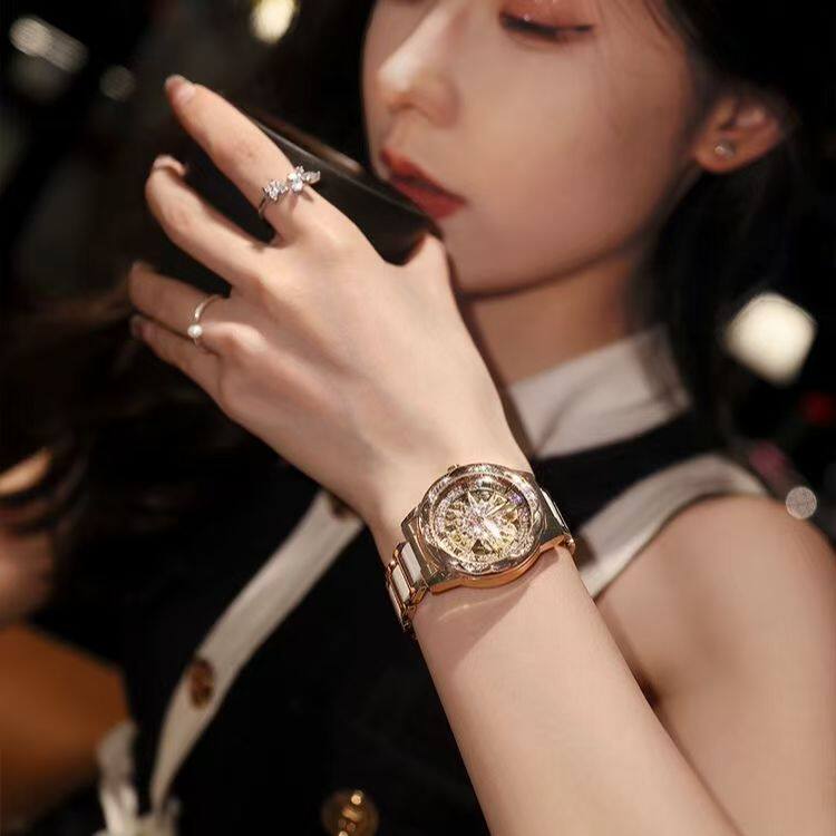 A generation of shaking audio and video number explosions sunflower hollow ladies watch ceramic white flywheel diamond watch women 9 undefined