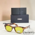 Tortoiseshell framed yellow piece