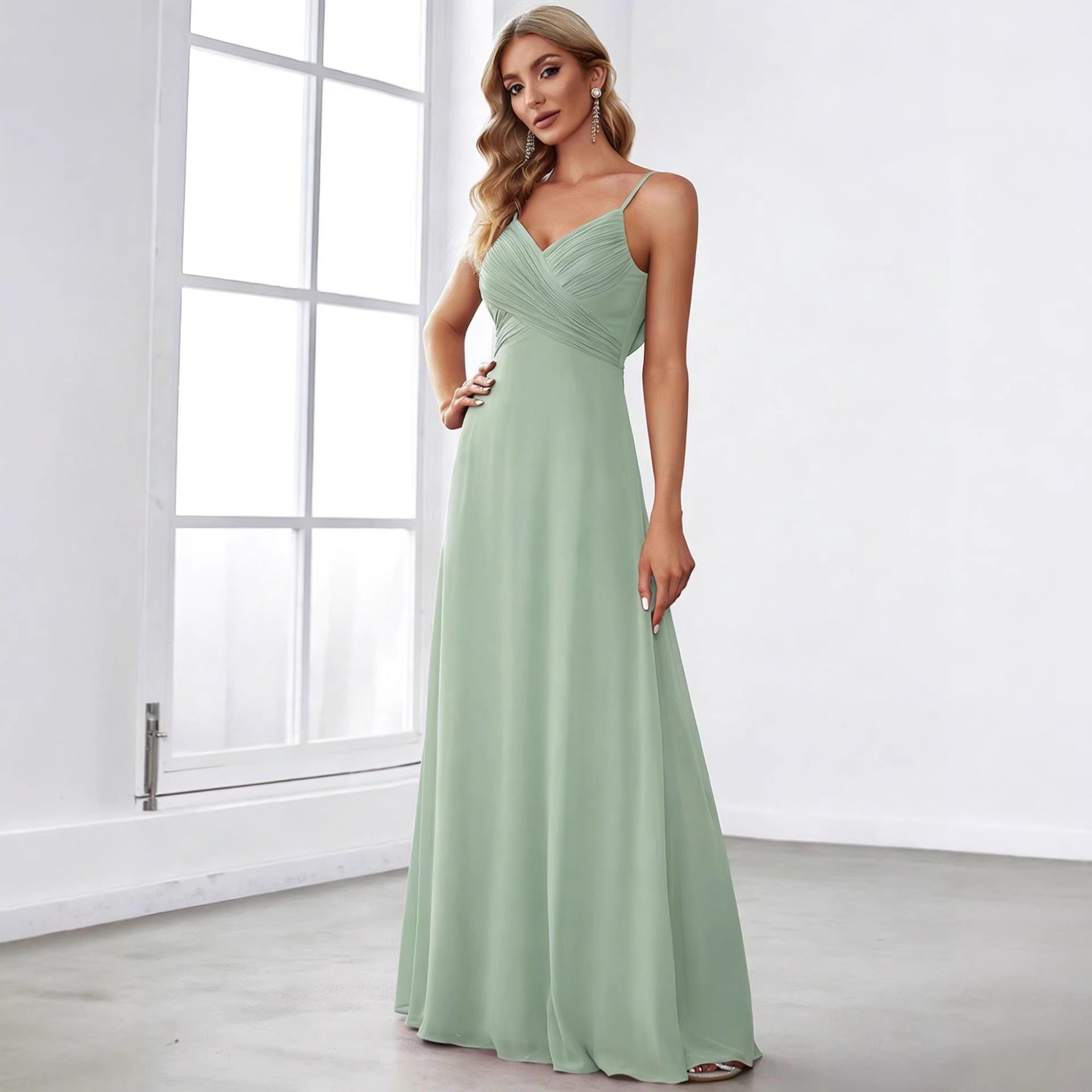 Sleeveless Deep V Neck Chiffon Dress Solid Color Pleated Front Elegant Design Perfect for Parties and Special