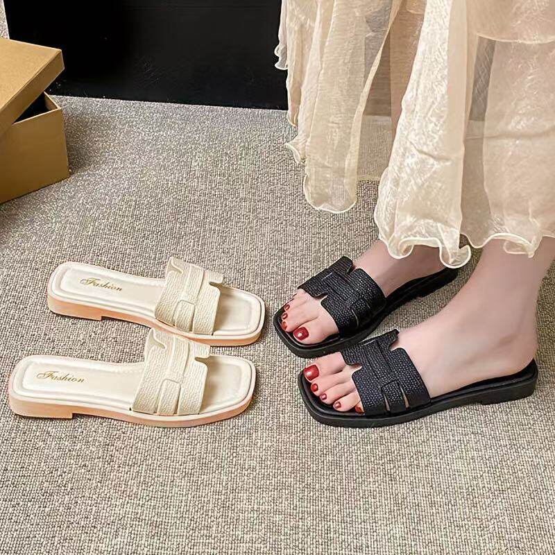 Korean version of slippers women's one-word new flat-bottomed net red out summer wear small fragrant style high-end beach slippers wholesale