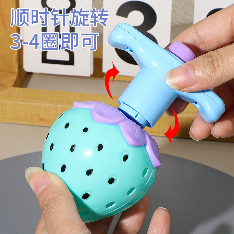 Strawberry luminous rotating gyro bright light emitting gyro catapult gyro nostalgic student gifts children's toys wholesale