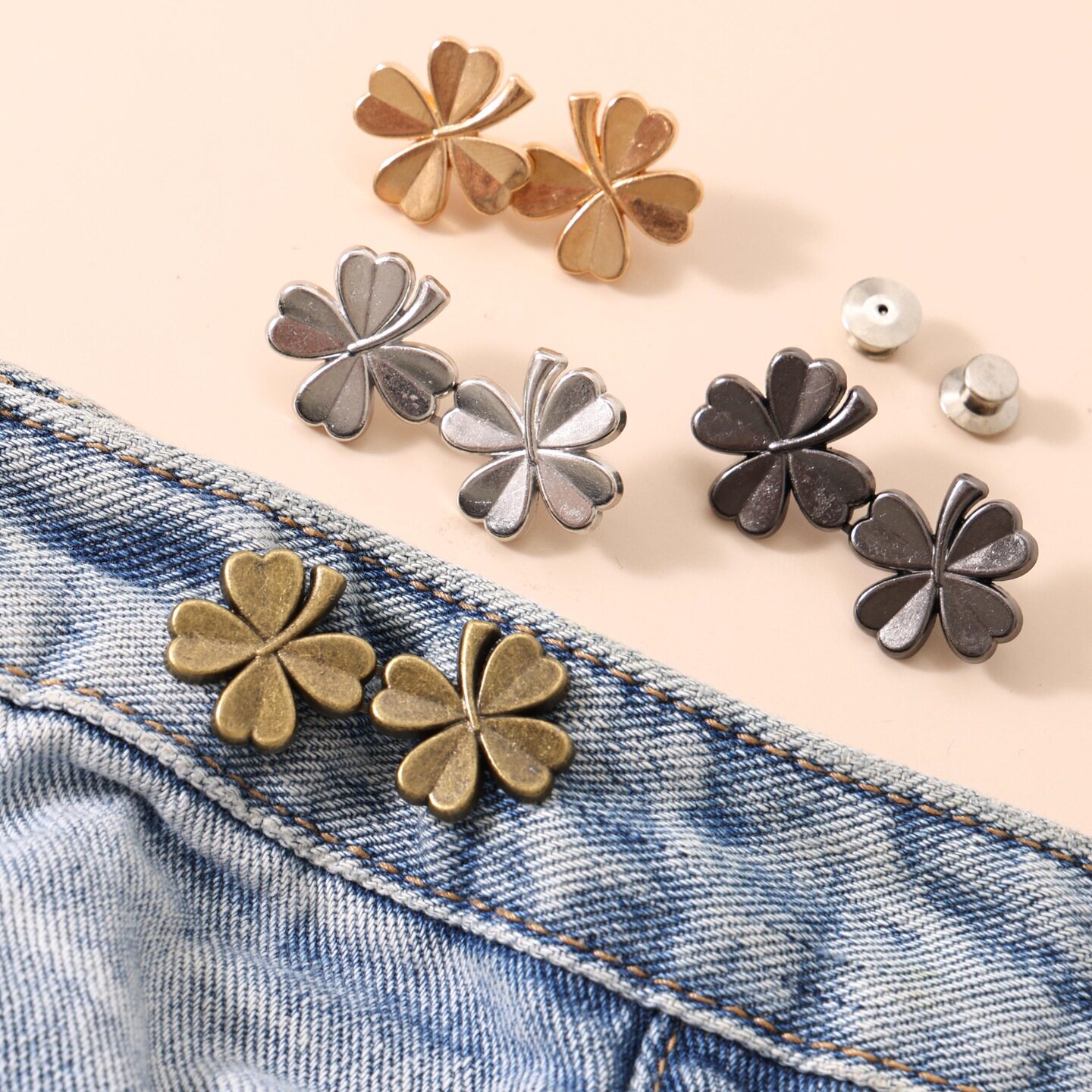 กระดุมเอวทรงดอกไม้ทำจากโลหะ ปรับระดับได้ ถอดออกได้ สำหรับกางเกงยีนส์ เครื่องมือปรับความแน่นของเอวแบบไม่ต้องเจาะ ใช้สำหรับปรับขนาดกางเกง