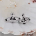 Silver and black diamond saturn stud earrings