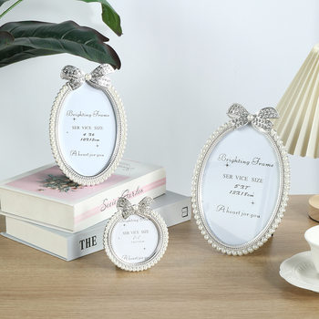 European creative bow White 3 inch children's photo frame Pearl 7 inch 2088 Oval photo frame direct wholesale