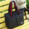 New canvas women's handbag casual bag mummy lunch bag solid color retro hand bag white ditch factory wholesale