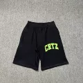 823 black and green shorts