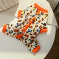 497 four-legged orange leopard print dinosaur