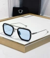 Silver and black frame blue film