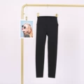 Black cropped trousers with calf logo