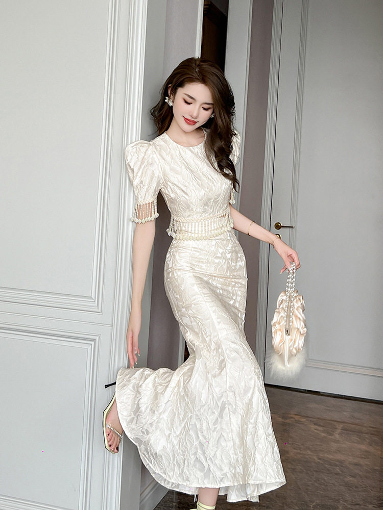 Đầm ôm body nữ cổ tròn tay bồng đuôi cá — [Màu hồng đào]