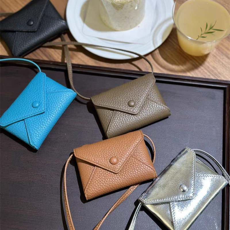 A generation of envelope hanging neck coin purse multi-color optional button slung mini bag factory outlet