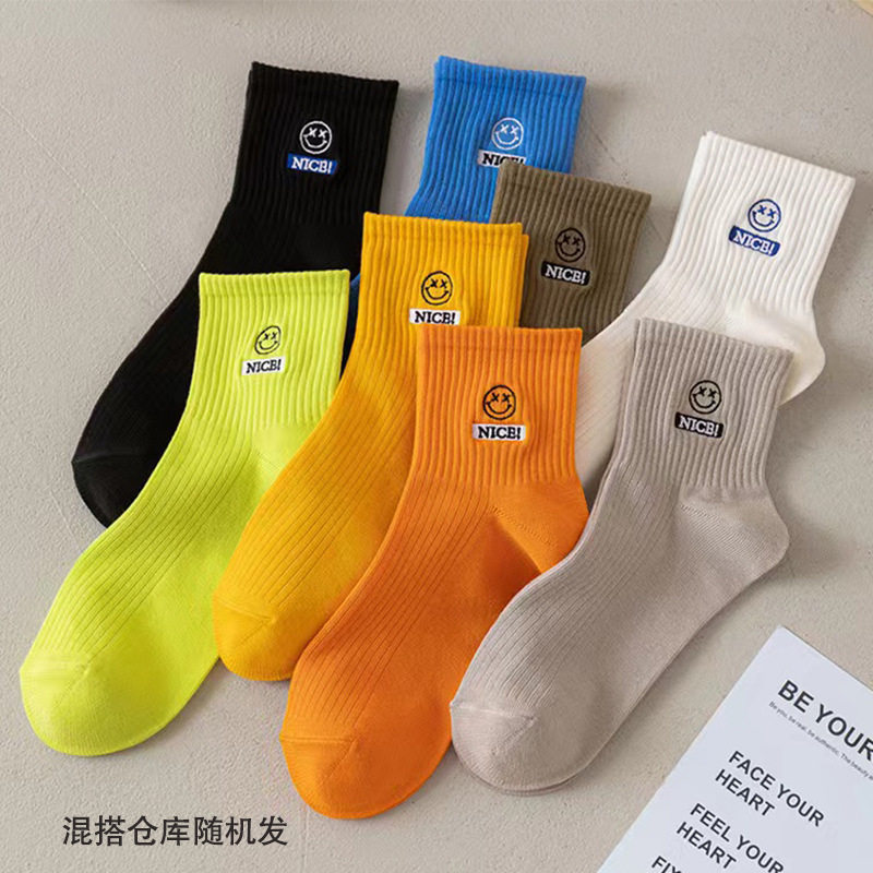 诸暨袜业跨境笑脸糖果纯色潮袜透气春夏季卡通中筒袜子女士批发