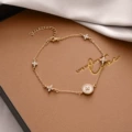 2065# plum cross bracelet