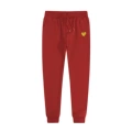 Red sweatpants with gold eye detail