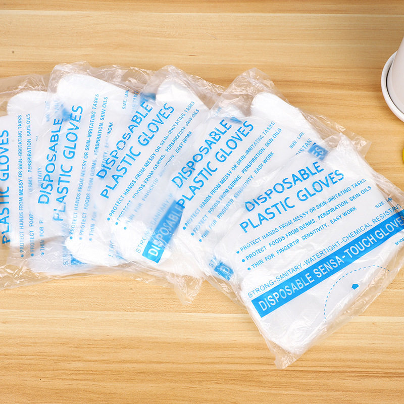 Factory direct food catering baking hair plastic transparent thickened pe gloves 100 wholesale disposable gloves
