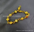 Gold dice bracelet