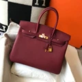 Burgundy gold buckle