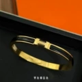 Gold black enamel bracelet