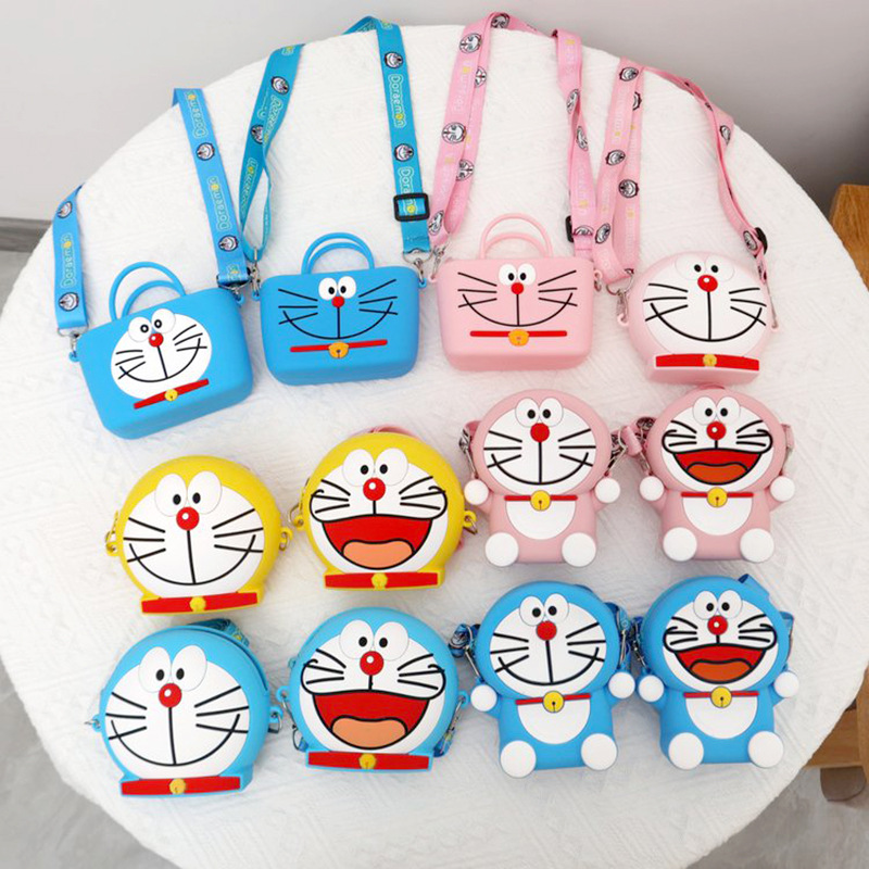 Shake Sound Child Bags Cute Cartoon Jingle cats Little Girl Oblique Satchel Silicone Shoulder Packet Purse Wholesale  抖音儿童包包可爱卡通叮当猫小女孩斜挎包硅胶单肩小包零钱包批发 Shake Sound Child Bags Cute Cartoon Jingle cats Little Girl Oblique Satchel Silicone Shoulder Packet Purse Wholesale 