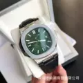 Black leather and green surface
