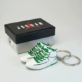 2 white and green pair with red flying man box